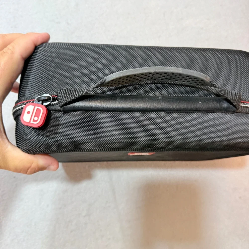 Nintendo Switch Black Hard Shell Carrying‎ Case w/ Zippered Pouch and Red accent
